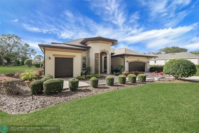 Welcome to your future oasis! This exquisite residence located on Harbor Hills Country Club in Florida - for sale on GolfHomes.com, golf home, golf lot