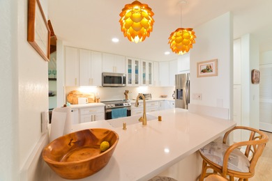 This stunning, upscale, totally renovated oceanfront view condo on Kona Country Club Golf Course in Hawaii - for sale on GolfHomes.com, golf home, golf lot