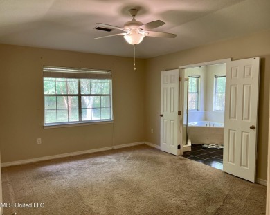 Welcome to your next chapter near Hickory Hill Golf Country Club on Mississippi National Golf Course in Mississippi - for sale on GolfHomes.com, golf home, golf lot