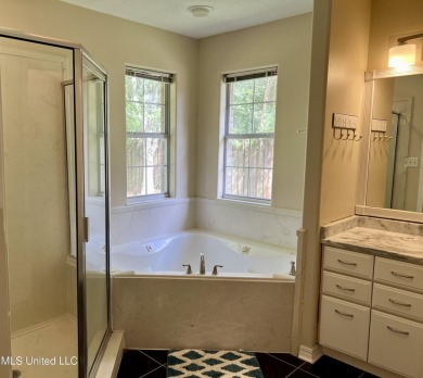 Welcome to your next chapter near Hickory Hill Golf Country Club on Mississippi National Golf Course in Mississippi - for sale on GolfHomes.com, golf home, golf lot