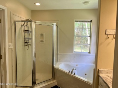 Welcome to your next chapter near Hickory Hill Golf Country Club on Mississippi National Golf Course in Mississippi - for sale on GolfHomes.com, golf home, golf lot
