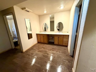 Come see this 4-level home, ideally situated in a desirable GOLF on Desert Hawk At Pueblo West in Colorado - for sale on GolfHomes.com, golf home, golf lot