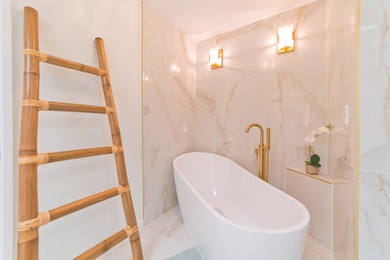 This stunning, upscale, totally renovated oceanfront view condo on Kona Country Club Golf Course in Hawaii - for sale on GolfHomes.com, golf home, golf lot