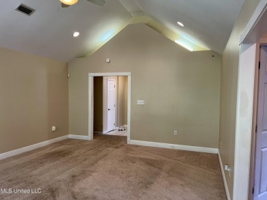 Welcome to your next chapter near Hickory Hill Golf Country Club on Mississippi National Golf Course in Mississippi - for sale on GolfHomes.com, golf home, golf lot