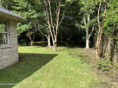 Welcome to your next chapter near Hickory Hill Golf Country Club on Mississippi National Golf Course in Mississippi - for sale on GolfHomes.com, golf home, golf lot