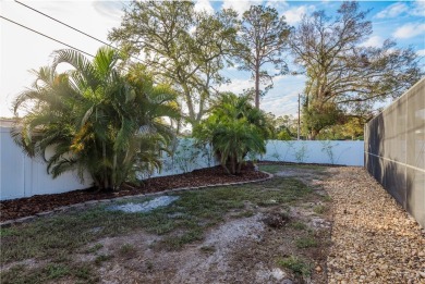 Under contract-accepting backup offers. PRICE ADJUSTMENT on The Dunedin Country Club in Florida - for sale on GolfHomes.com, golf home, golf lot