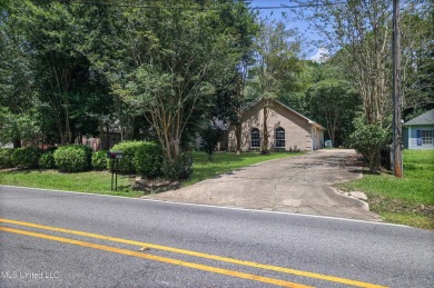 Welcome to your next chapter near Hickory Hill Golf Country Club on Mississippi National Golf Course in Mississippi - for sale on GolfHomes.com, golf home, golf lot