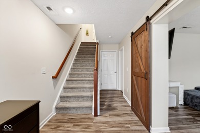 Discover elevated, low-maintenance living in this beautifully on The Bridgewater Club  in Indiana - for sale on GolfHomes.com, golf home, golf lot