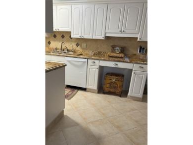 RENOVATED FRESH PAINT EXPANSIVE WATER VIEW WALK TO HOUSES OF on Hillsboro Pines Golf in Florida - for sale on GolfHomes.com, golf home, golf lot