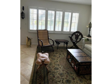 RENOVATED FRESH PAINT EXPANSIVE WATER VIEW WALK TO HOUSES OF on Hillsboro Pines Golf in Florida - for sale on GolfHomes.com, golf home, golf lot