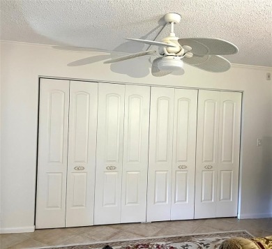 RENOVATED FRESH PAINT EXPANSIVE WATER VIEW WALK TO HOUSES OF on Hillsboro Pines Golf in Florida - for sale on GolfHomes.com, golf home, golf lot