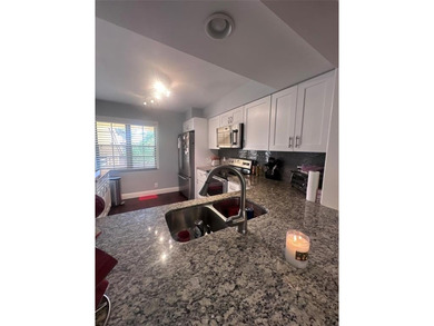 REDUCED PRICE!!This beautifully remodeled and tastefully on Indian Spring Golf and Country Club in Florida - for sale on GolfHomes.com, golf home, golf lot