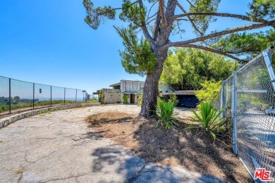 180 degree VIEWS of the mountains, city and ocean! Ideally on Bel-Air Country Club in California - for sale on GolfHomes.com, golf home, golf lot