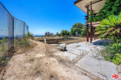 180 degree VIEWS of the mountains, city and ocean! Ideally on Bel-Air Country Club in California - for sale on GolfHomes.com, golf home, golf lot