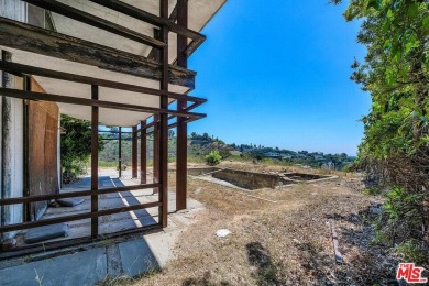 180 degree VIEWS of the mountains, city and ocean! Ideally on Bel-Air Country Club in California - for sale on GolfHomes.com, golf home, golf lot