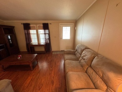 Centrally located, welcome to your new home in beautiful Winter on Lake Henry Golf Club in Florida - for sale on GolfHomes.com, golf home, golf lot