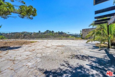 180 degree VIEWS of the mountains, city and ocean! Ideally on Bel-Air Country Club in California - for sale on GolfHomes.com, golf home, golf lot