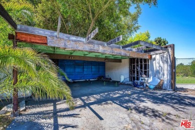 180 degree VIEWS of the mountains, city and ocean! Ideally on Bel-Air Country Club in California - for sale on GolfHomes.com, golf home, golf lot