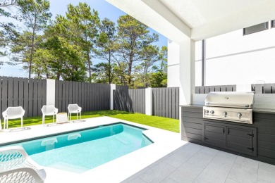 Seller is offering a $200,000 gross rental income guarantee for on Santa Rosa Golf and Beach Club in Florida - for sale on GolfHomes.com, golf home, golf lot