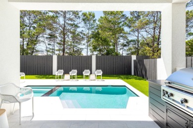 Seller is offering a $200,000 gross rental income guarantee for on Santa Rosa Golf and Beach Club in Florida - for sale on GolfHomes.com, golf home, golf lot