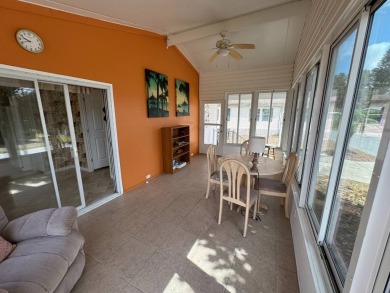 Centrally located, welcome to your new home in beautiful Winter on Lake Henry Golf Club in Florida - for sale on GolfHomes.com, golf home, golf lot