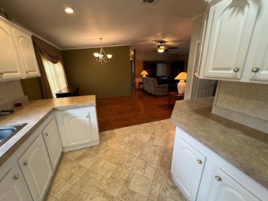 Centrally located, welcome to your new home in beautiful Winter on Lake Henry Golf Club in Florida - for sale on GolfHomes.com, golf home, golf lot