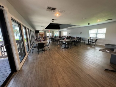 Centrally located, welcome to your new home in beautiful Winter on Lake Henry Golf Club in Florida - for sale on GolfHomes.com, golf home, golf lot