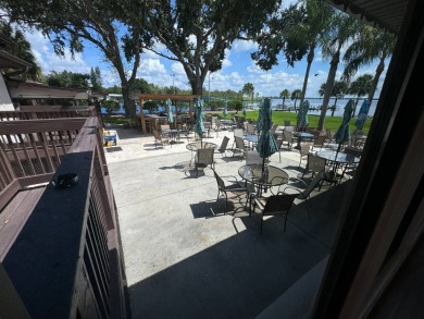 Centrally located, welcome to your new home in beautiful Winter on Lake Henry Golf Club in Florida - for sale on GolfHomes.com, golf home, golf lot