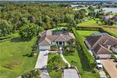 Your oasis awaits in this Naples retreat, offering a peaceful on Eagle Lakes Golf Club in Florida - for sale on GolfHomes.com, golf home, golf lot