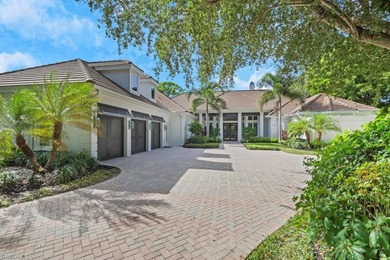 Experience elevated coastal living in this stunning Pelican Bay on Club at Pelican Bay Golf Course in Florida - for sale on GolfHomes.com, golf home, golf lot