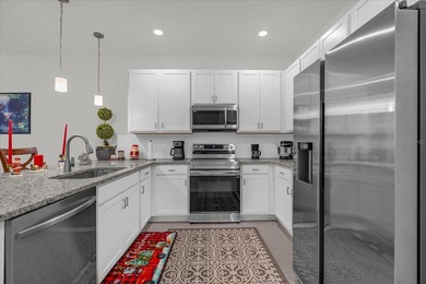 Don't miss your opportunity to own this turn-key townhome that on Harmony Golf Preserve in Florida - for sale on GolfHomes.com, golf home, golf lot