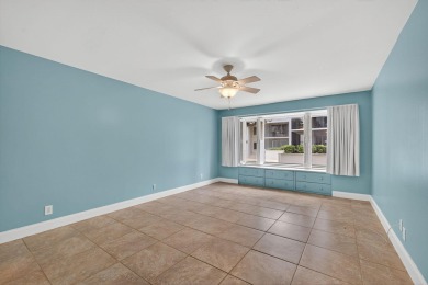 LIGHT AND SPACIOUS, FIRST FLOOR CORNER UNIT IN POPULAR 55+ on BallenIsles Golf and Country Club in Florida - for sale on GolfHomes.com, golf home, golf lot