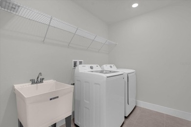 Don't miss your opportunity to own this turn-key townhome that on Harmony Golf Preserve in Florida - for sale on GolfHomes.com, golf home, golf lot