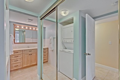LIGHT AND SPACIOUS, FIRST FLOOR CORNER UNIT IN POPULAR 55+ on BallenIsles Golf and Country Club in Florida - for sale on GolfHomes.com, golf home, golf lot