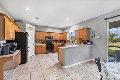 This two-story home offers 4 bedrooms, 3.5 baths, and 2,930 on River Strand Golf and Country Club At Heritage Harbour  in Florida - for sale on GolfHomes.com, golf home, golf lot