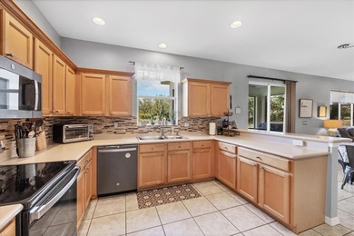 This two-story home offers 4 bedrooms, 3.5 baths, and 2,930 on River Strand Golf and Country Club At Heritage Harbour  in Florida - for sale on GolfHomes.com, golf home, golf lot