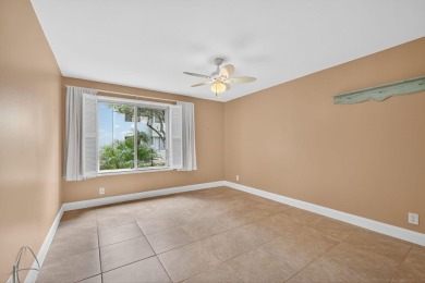 LIGHT AND SPACIOUS, FIRST FLOOR CORNER UNIT IN POPULAR 55+ on BallenIsles Golf and Country Club in Florida - for sale on GolfHomes.com, golf home, golf lot