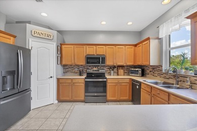 This two-story home offers 4 bedrooms, 3.5 baths, and 2,930 on River Strand Golf and Country Club At Heritage Harbour  in Florida - for sale on GolfHomes.com, golf home, golf lot