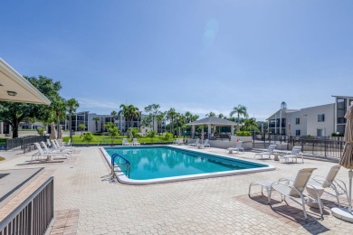 LIGHT AND SPACIOUS, FIRST FLOOR CORNER UNIT IN POPULAR 55+ on BallenIsles Golf and Country Club in Florida - for sale on GolfHomes.com, golf home, golf lot