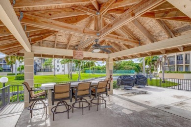 LIGHT AND SPACIOUS, FIRST FLOOR CORNER UNIT IN POPULAR 55+ on BallenIsles Golf and Country Club in Florida - for sale on GolfHomes.com, golf home, golf lot