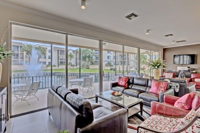 LIGHT AND SPACIOUS, FIRST FLOOR CORNER UNIT IN POPULAR 55+ on BallenIsles Golf and Country Club in Florida - for sale on GolfHomes.com, golf home, golf lot