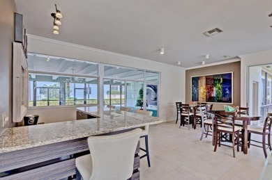LIGHT AND SPACIOUS, FIRST FLOOR CORNER UNIT IN POPULAR 55+ on BallenIsles Golf and Country Club in Florida - for sale on GolfHomes.com, golf home, golf lot