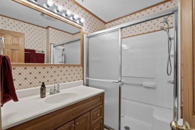 Welcome to this charming 4-bedroom, 3-bathroom all-brick ranch on Pine Lakes Country Club in South Carolina - for sale on GolfHomes.com, golf home, golf lot