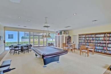 LIGHT AND SPACIOUS, FIRST FLOOR CORNER UNIT IN POPULAR 55+ on BallenIsles Golf and Country Club in Florida - for sale on GolfHomes.com, golf home, golf lot