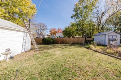 This 4-bedroom, 2-bathroom, over 2,300 square foot home, sits on L W Clapp Memorial Golf Course in Kansas - for sale on GolfHomes.com, golf home, golf lot