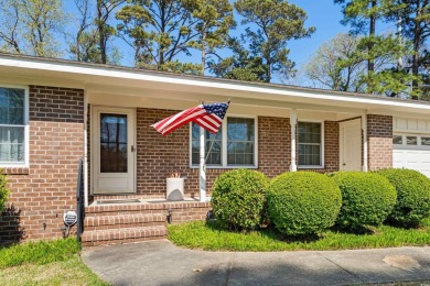 Welcome to this charming 4-bedroom, 3-bathroom all-brick ranch on Pine Lakes Country Club in South Carolina - for sale on GolfHomes.com, golf home, golf lot