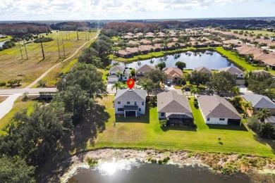 Under contract-accepting backup offers. This two-story home on River Strand Golf and Country Club At Heritage Harbour  in Florida - for sale on GolfHomes.com, golf home, golf lot