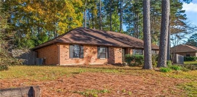 Welcome to this charming and inviting 4 bedroom, 2 full bath on The Golf Club At Timber Trails in Louisiana - for sale on GolfHomes.com, golf home, golf lot