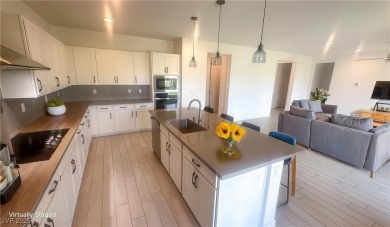 Experience refined living in this 1,981 sq ft 2022-built home in on Mountain Falls Golf Course in Nevada - for sale on GolfHomes.com, golf home, golf lot