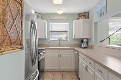 This beautifully updated freestanding three-bedroom beach villa on Sandpiper Cove Golf Course in Florida - for sale on GolfHomes.com, golf home, golf lot